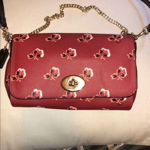 Coach crossbody deep red with floral details